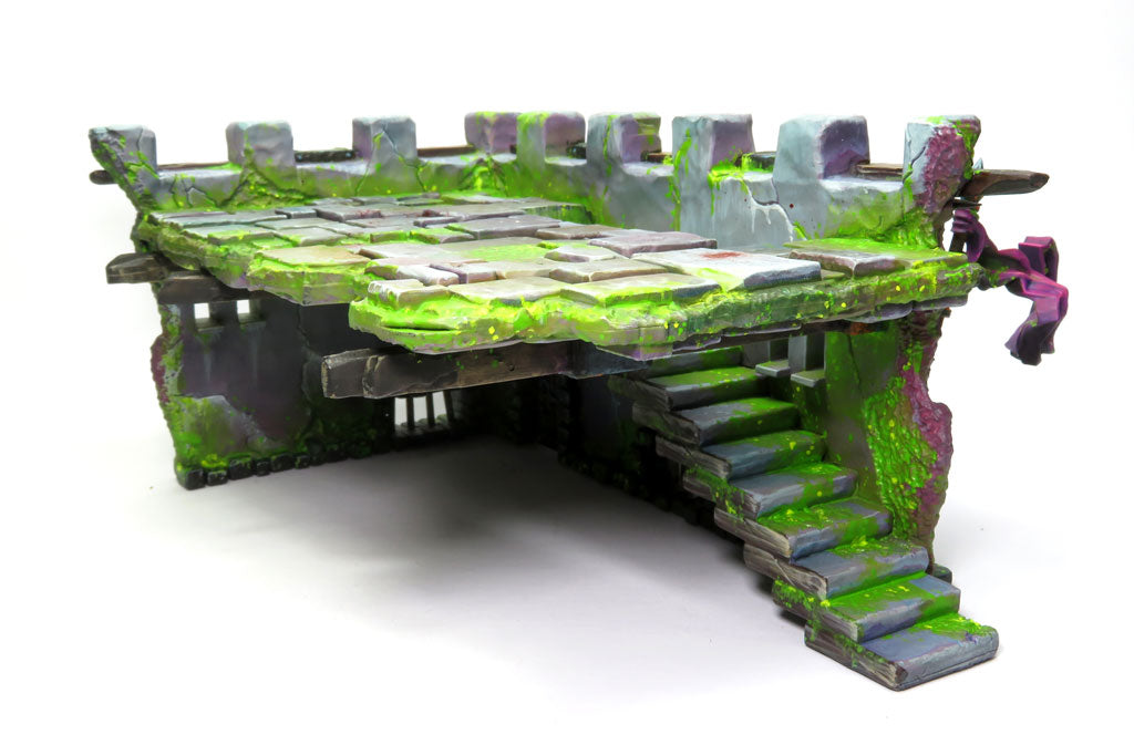 
                    
                      Malifaux terrain piece from WyrdScapes Makeshift Defenses set, featuring detailed makeshift barriers and rugged structures.
                    
                  