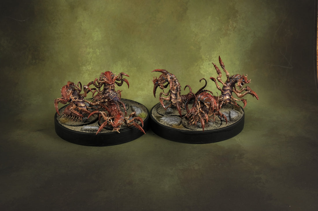 
                    
                      Wyrd Miniatures Karkinoi The Other Side unit box with painted miniatures on a display stand.
                    
                  