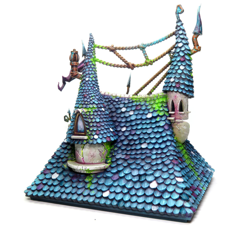 
                    
                      Ancient stone spire from Wyrdscapes Haunted Spires Malifaux terrain set with weathered, gothic architecture details.
                    
                  