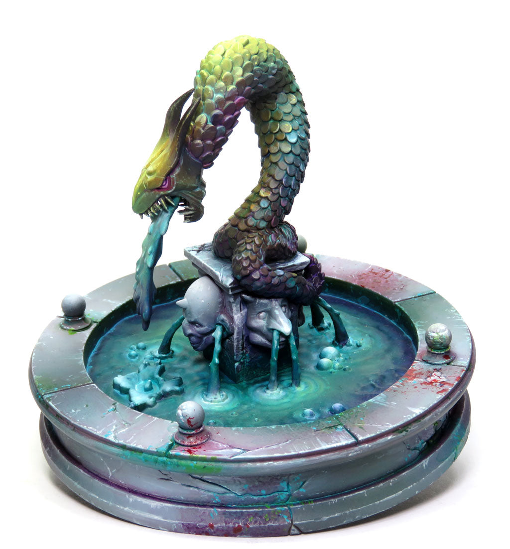 
                    
                      WyrdScapes Makeshift Defenses Malifaux terrain piece featuring a stone fountain with weathered details.
                    
                  